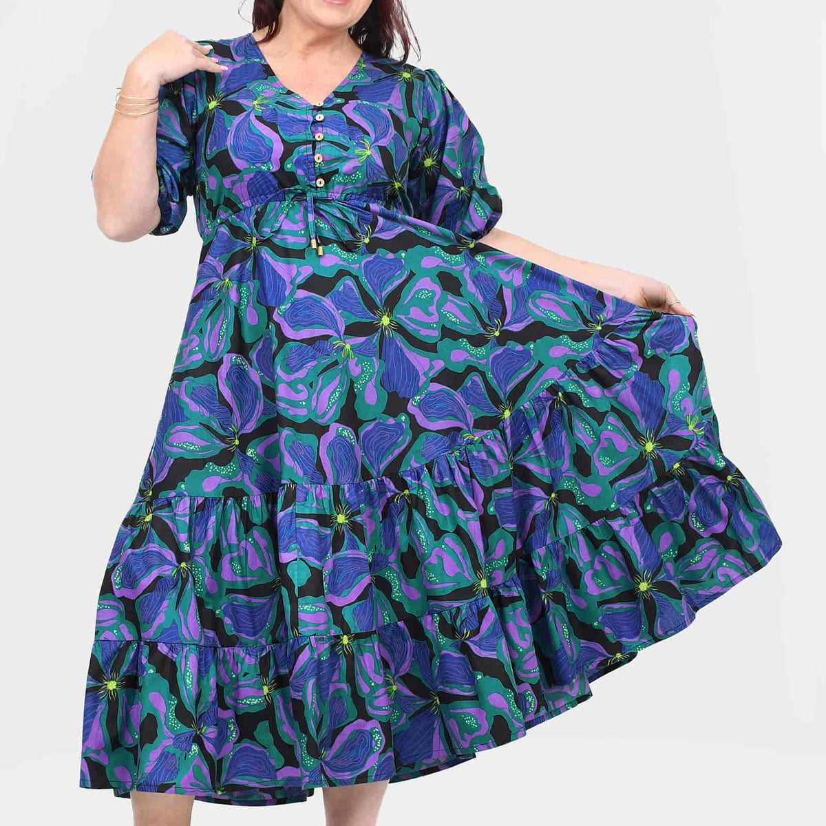 Teal midi dress with purple leaf pattern, button V-neck and tiered ruffle skirt, puff sleeves