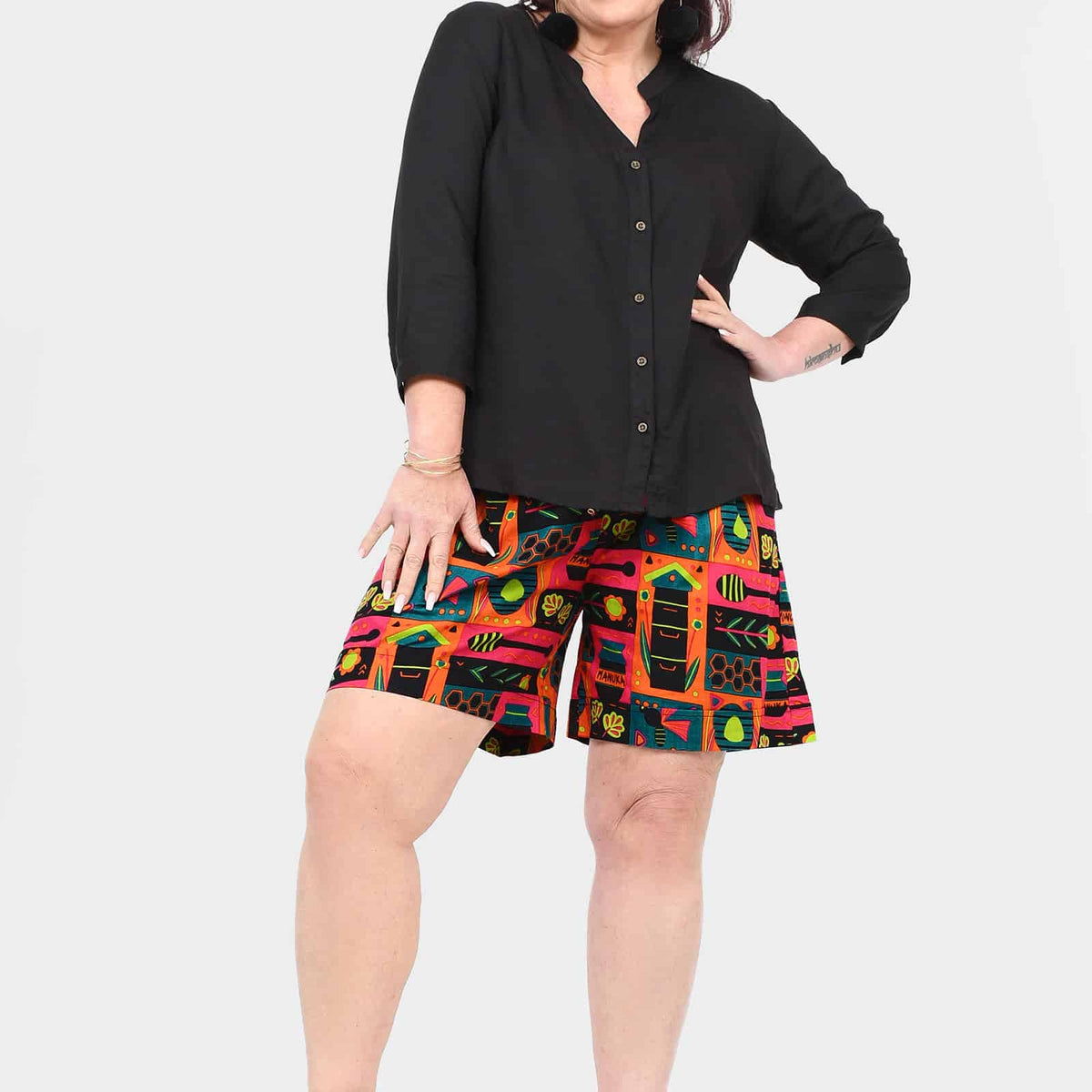 Bee-themed block print shorts, above-knee, front view with relaxed fit