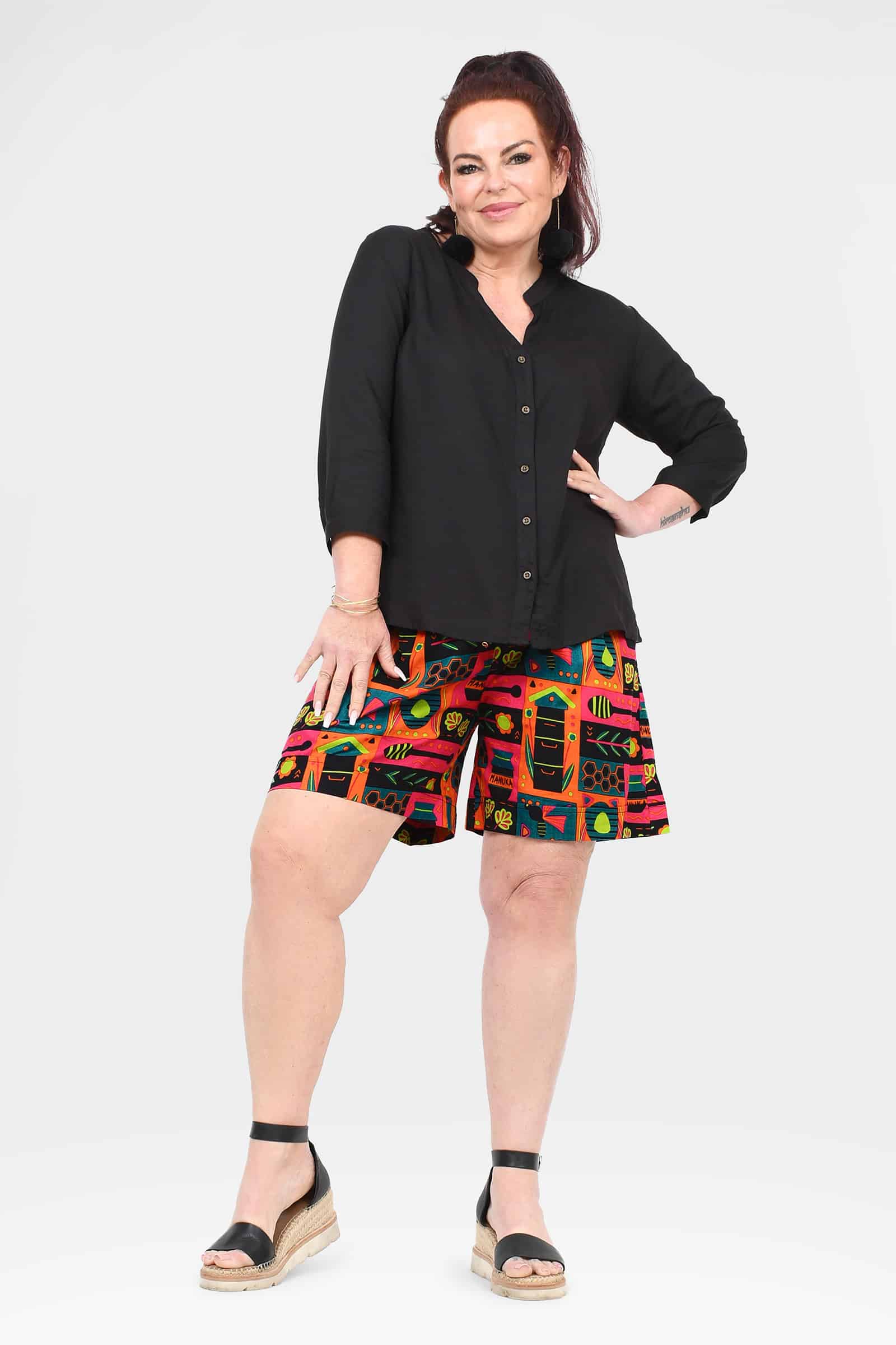 Bee-themed block print shorts, above-knee, front view with relaxed fit