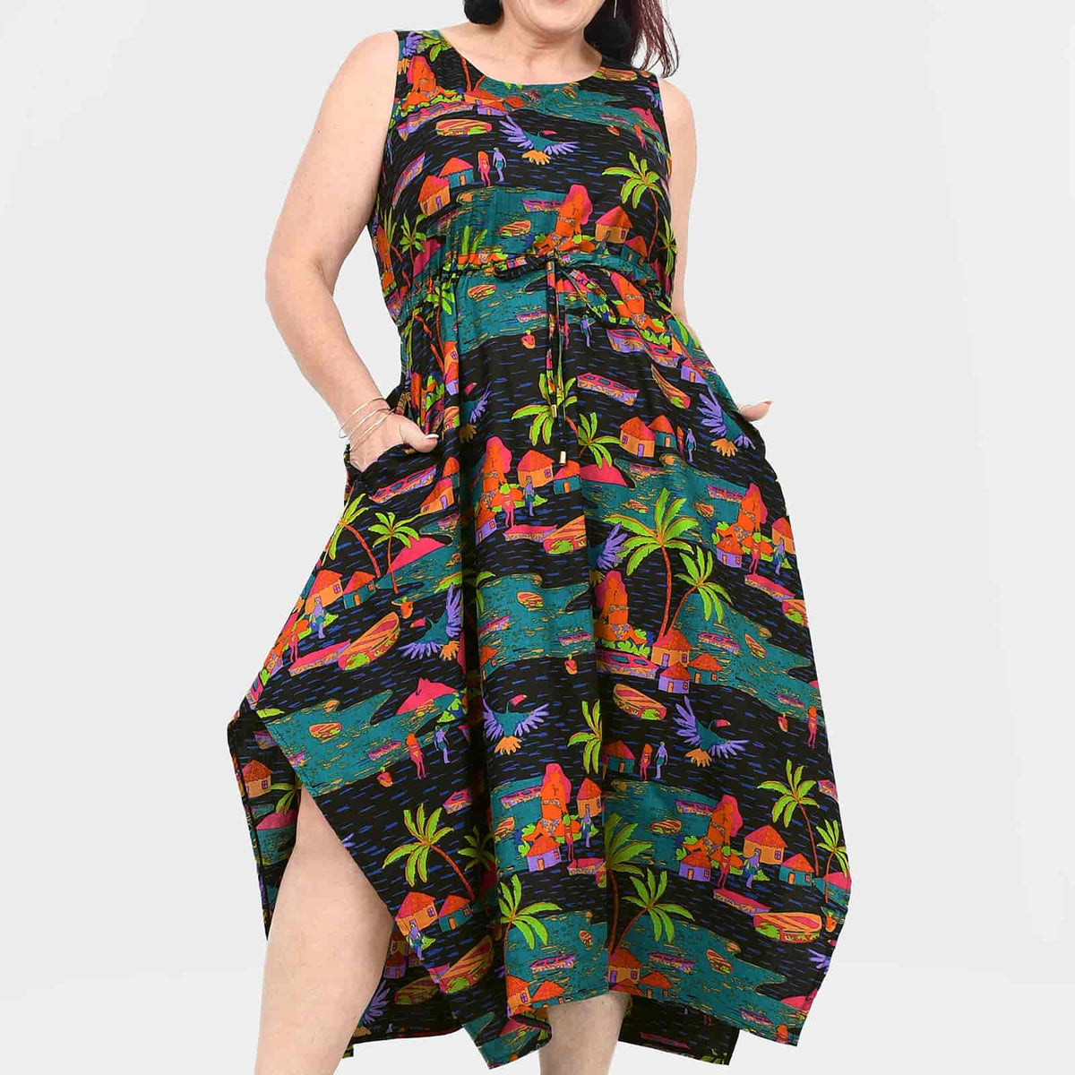 Sleeveless capri dress, vibrant tropical print, high-low hem and side pockets