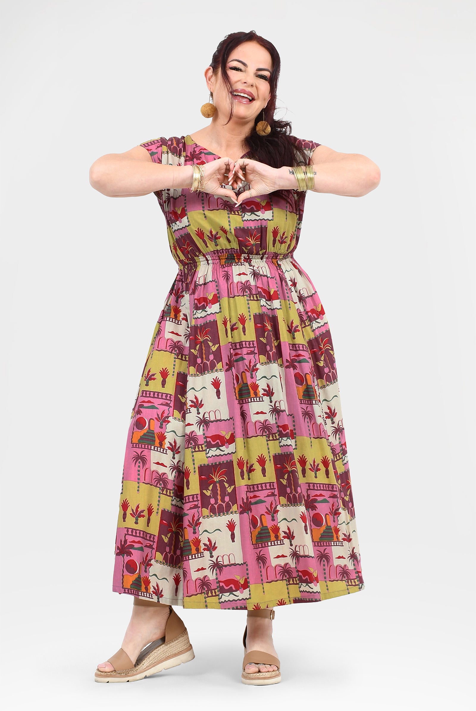 Pink long dress with colorful animal and cactus print, gathered skirt, sleeveless round neck
