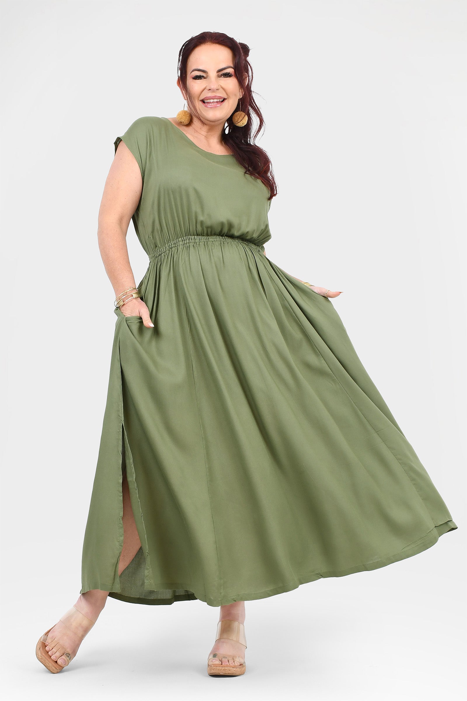 Olive green long dress with gathered waist, short sleeves, and side slit hem
