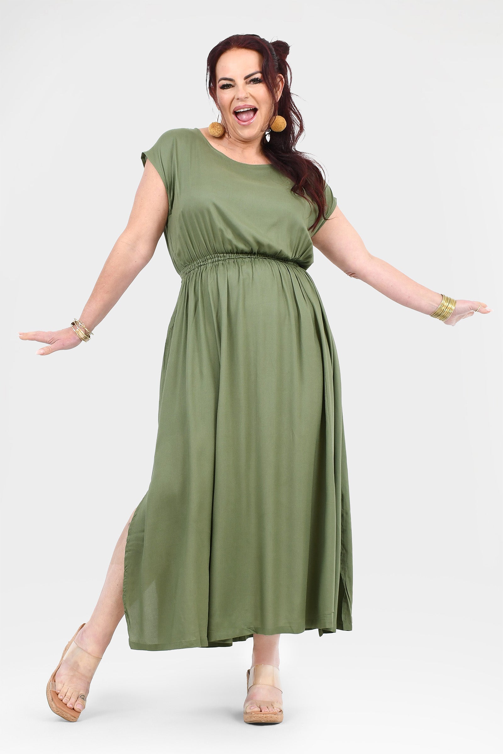 Olive green maxi dress with ruched waist and short sleeves, side slit at hem