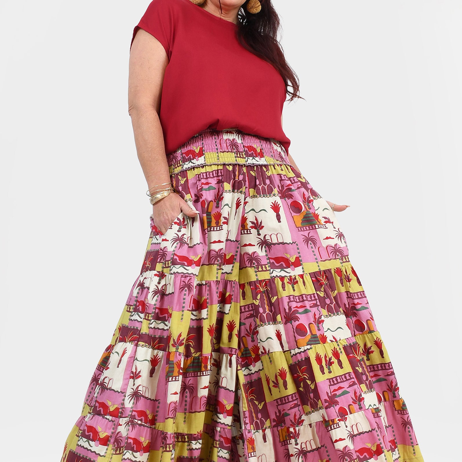 Havana pants front view: pink tiered midi skirt with colorful animal print stripes