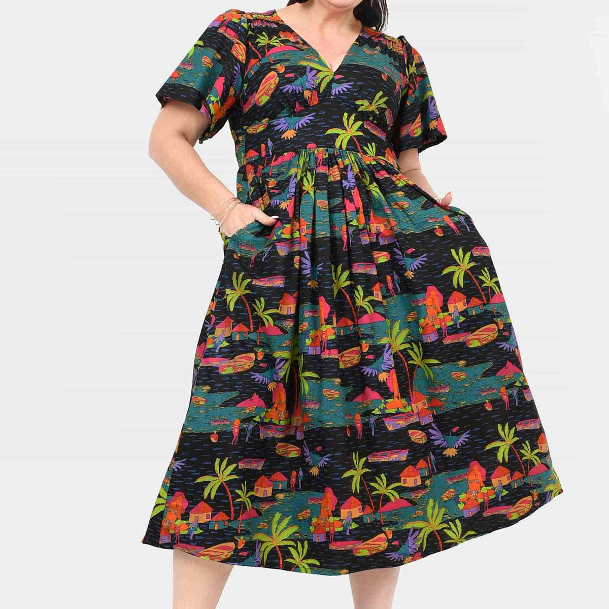 Printed midi dress with V-neck, short sleeves, gathered waist, tropical village scene