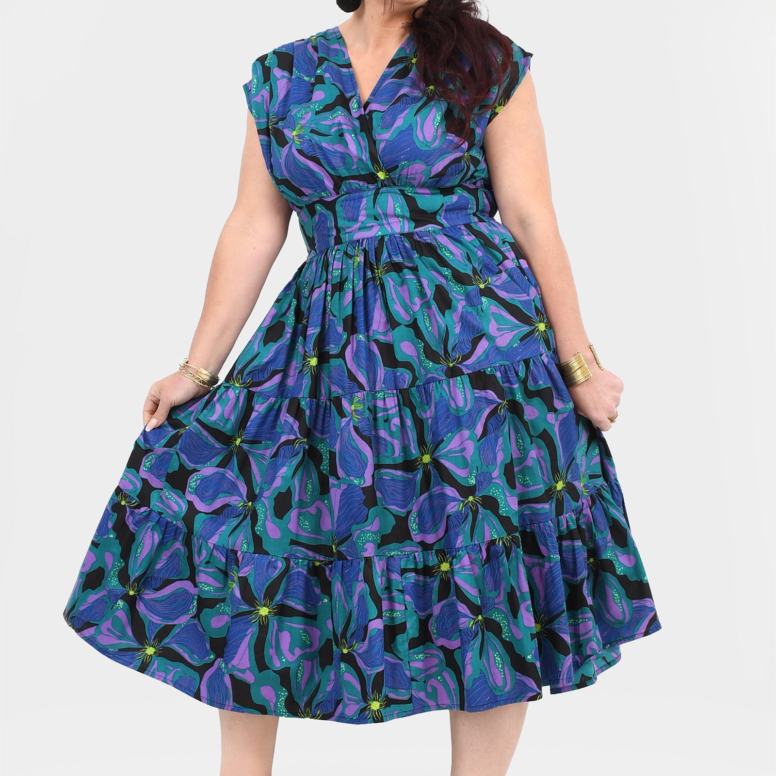Printed teal and purple midi dress with gathered bodice and tiered flared skirt