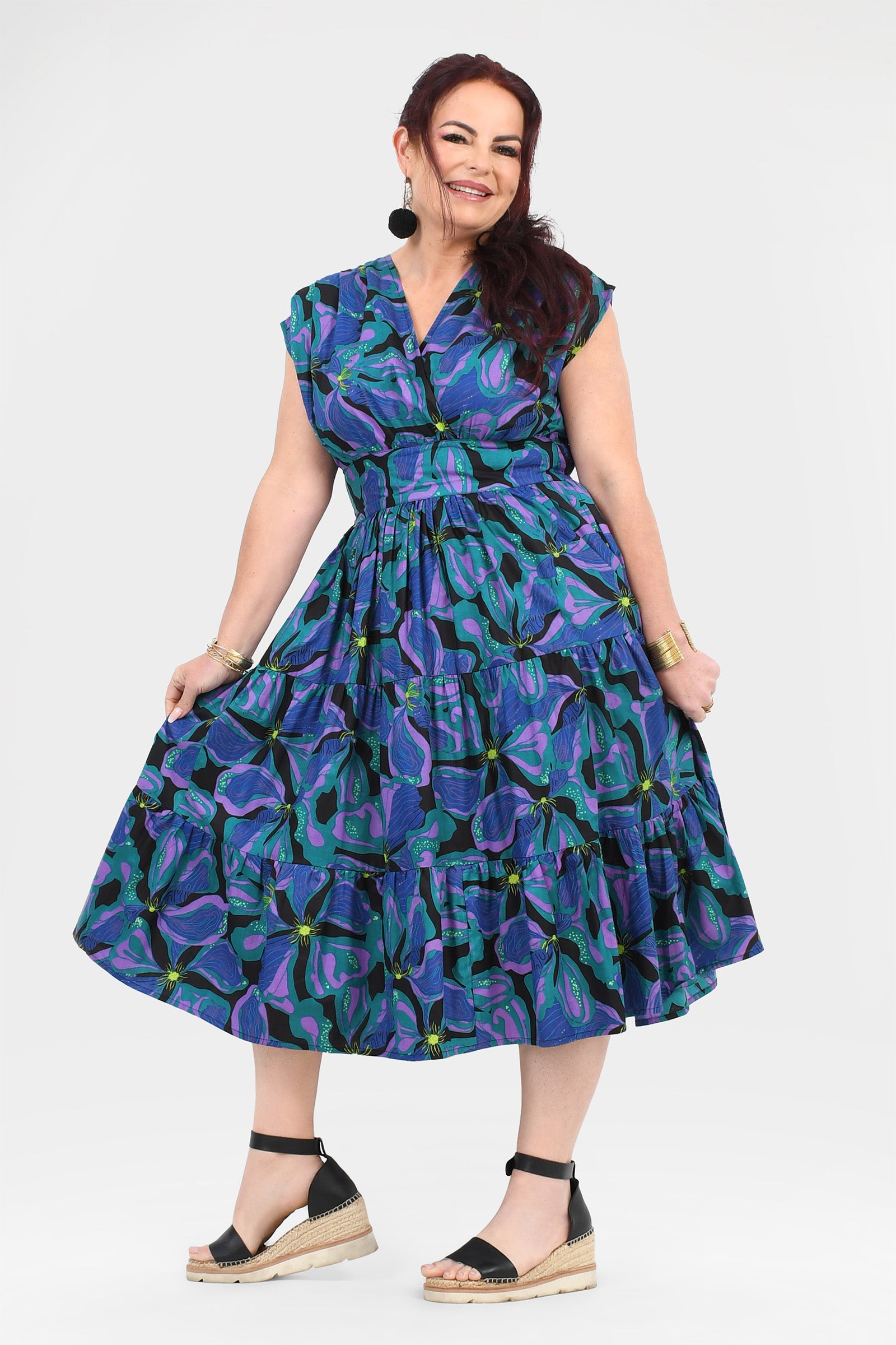 Printed teal and purple midi dress with gathered bodice and tiered flared skirt