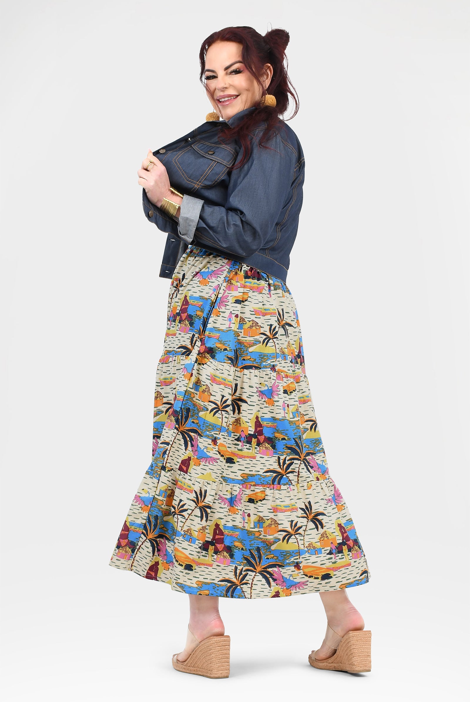 Multicolor tropical print maxi dress with sleeveless scoop neckline and flared skirt