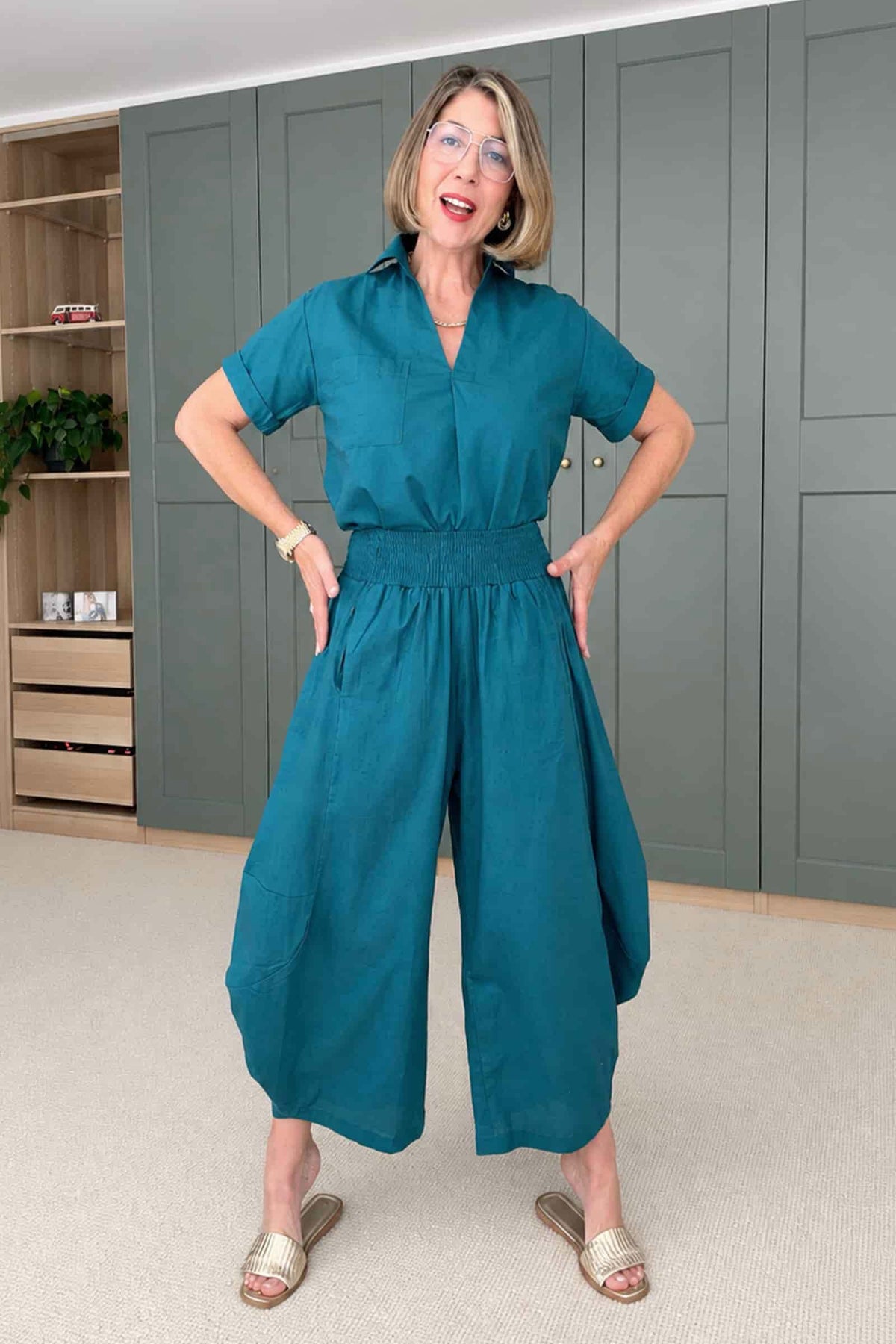 Teal wide-leg drawstring pants with front pockets