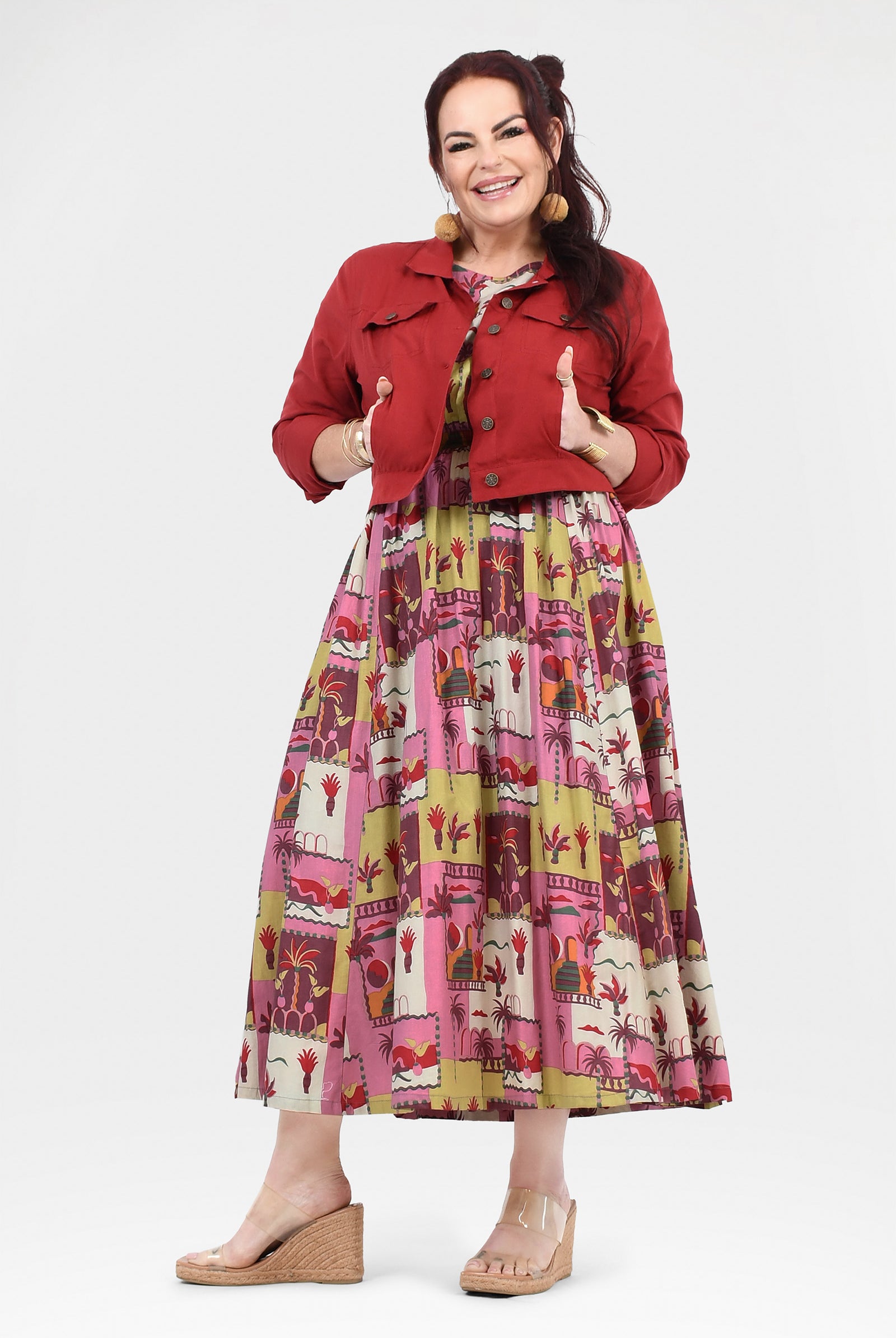 Pink long dress with colorful animal and cactus print, short sleeves and flared hem