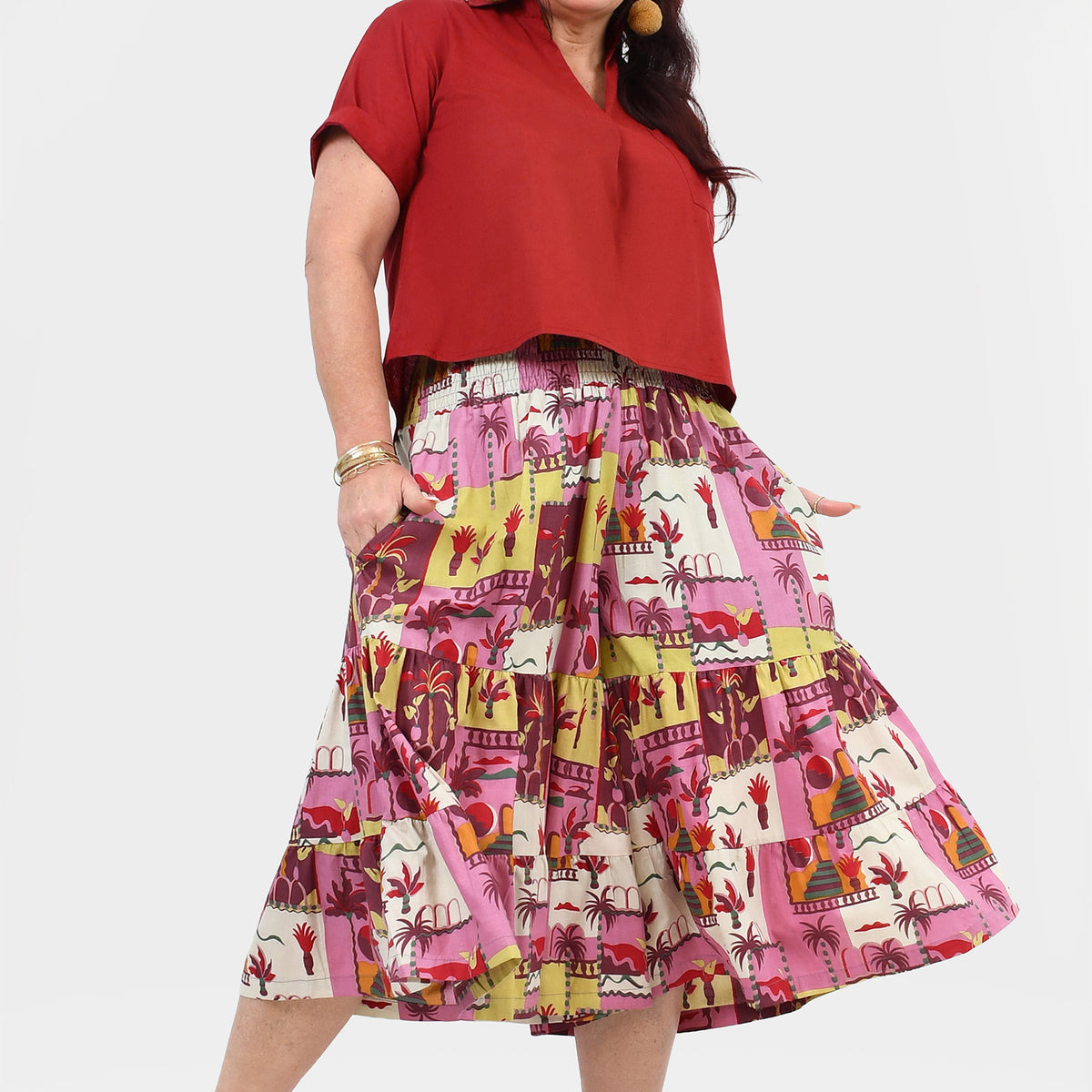 Pink multicolor tiered 3/4 pants with illustrated patchwork print