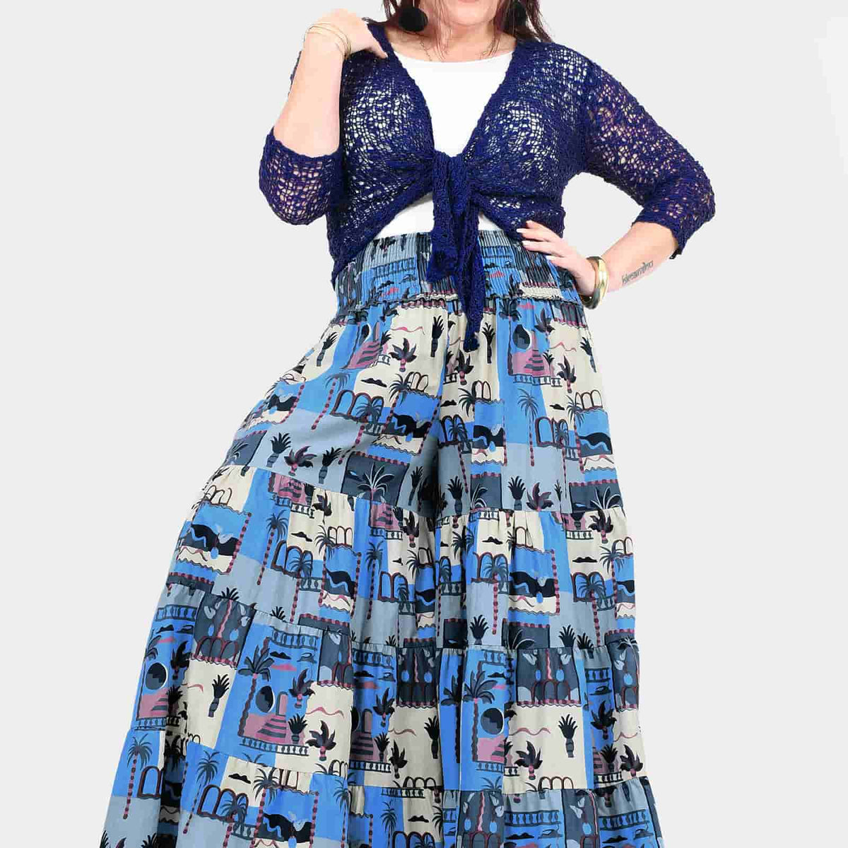 Printed A-line tiered skirt with blue and cream illustrated motifs