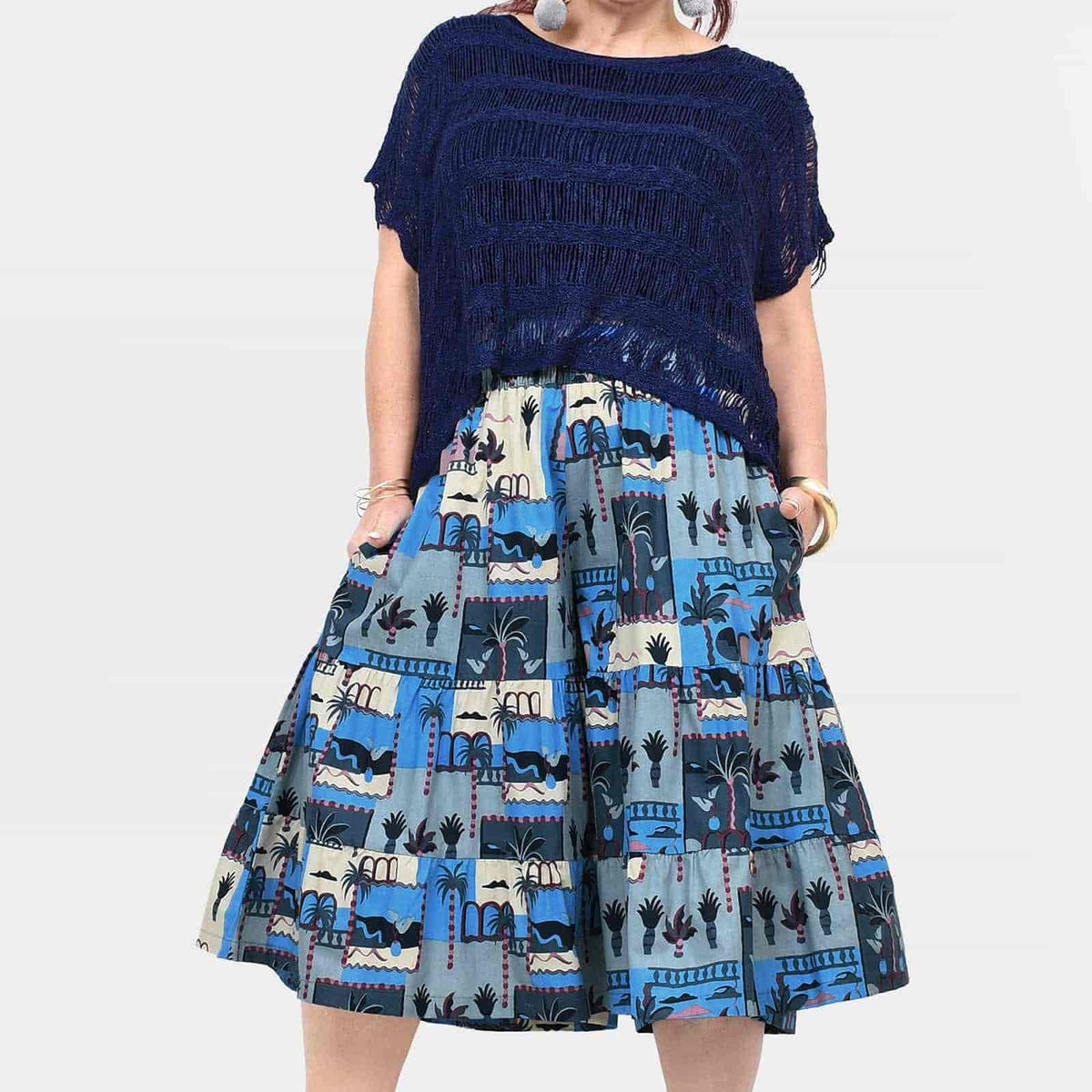 Navy and blue printed 3/4 pants with tiered, skirt-like hem and fringe trim