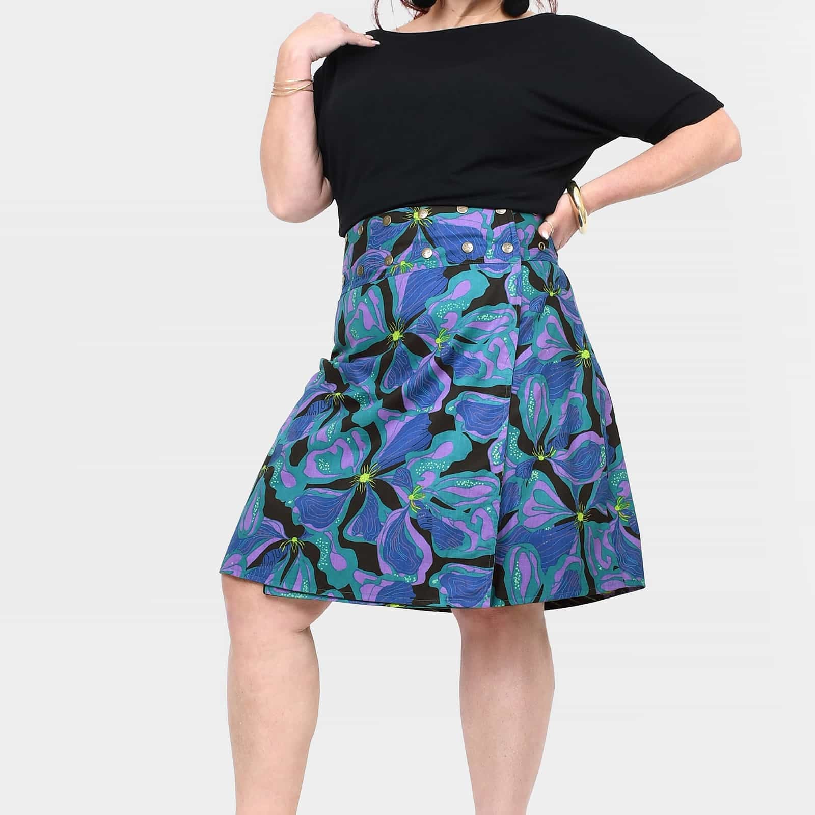 Reversible button skirt, black top with teal and purple swirling print, flared hem