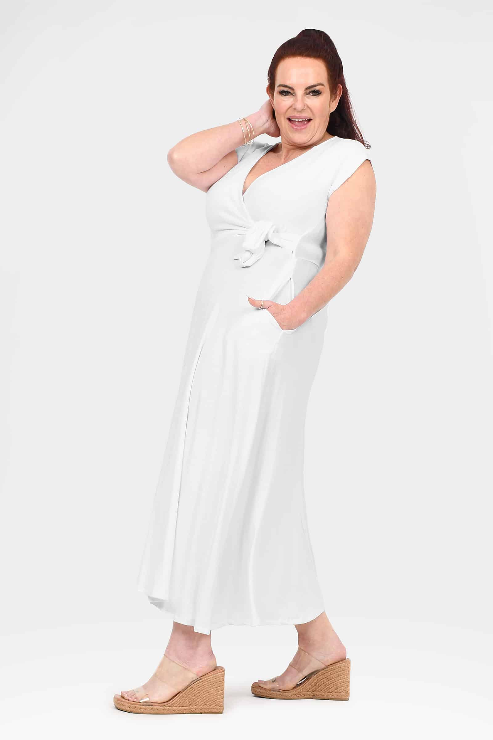 White V-neck midi dress with short sleeves and tied waist detail