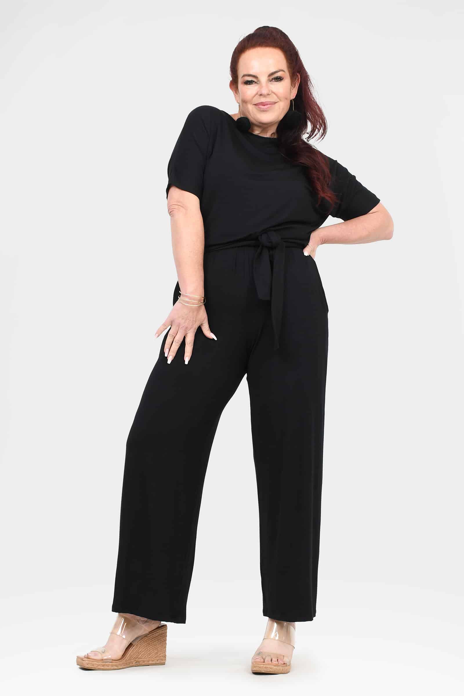 Black short-sleeve jumpsuit with tie waist and wide-leg trousers