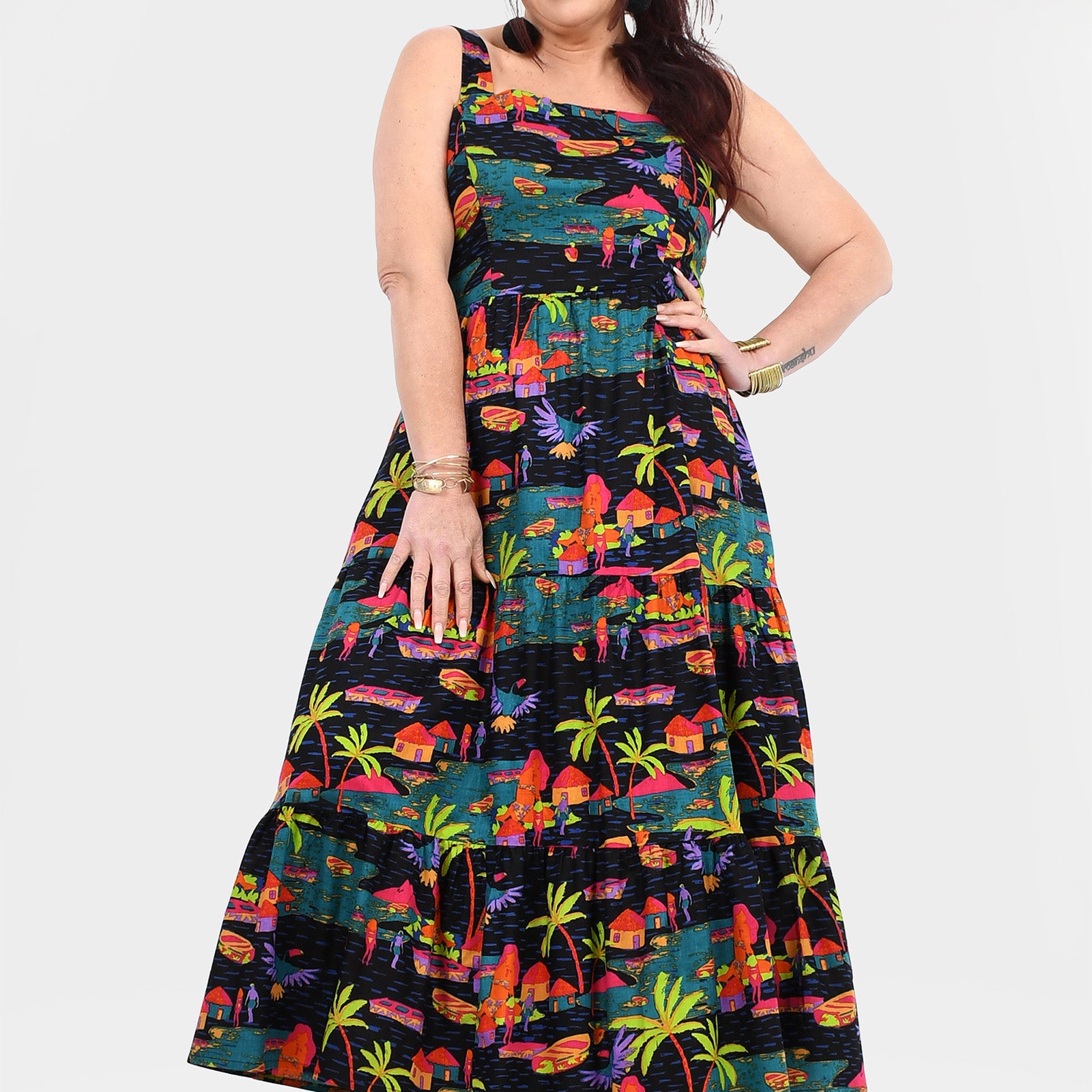 Sleeveless maxi dress with tropical multicolor print, cinched waist and flared hem