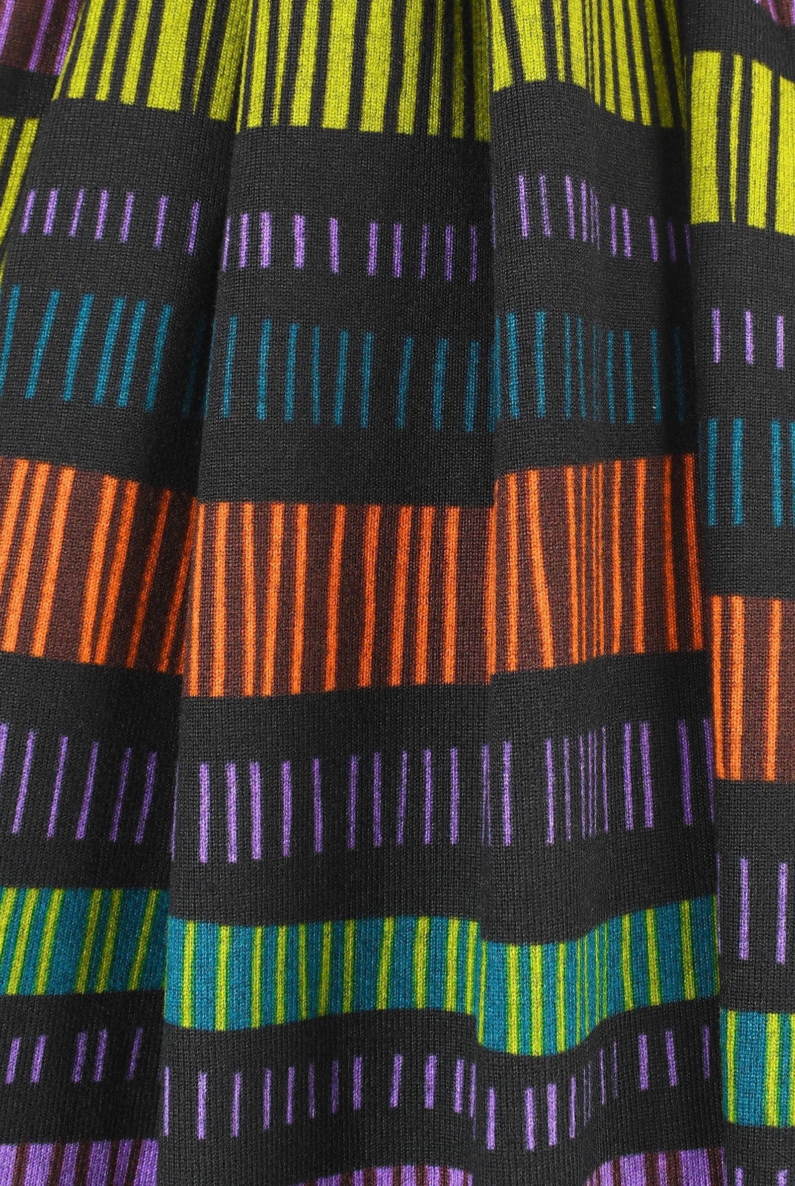 Close-up of fabric with multicolored striped pattern