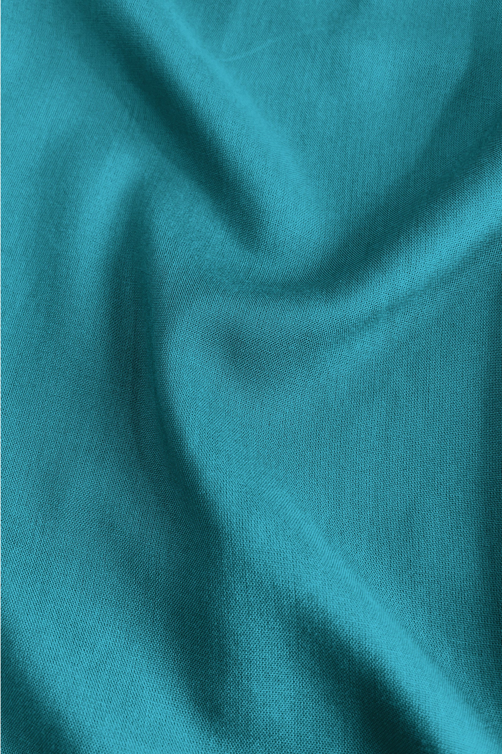Teal button-front blouse top with V-neck and soft fabric texture