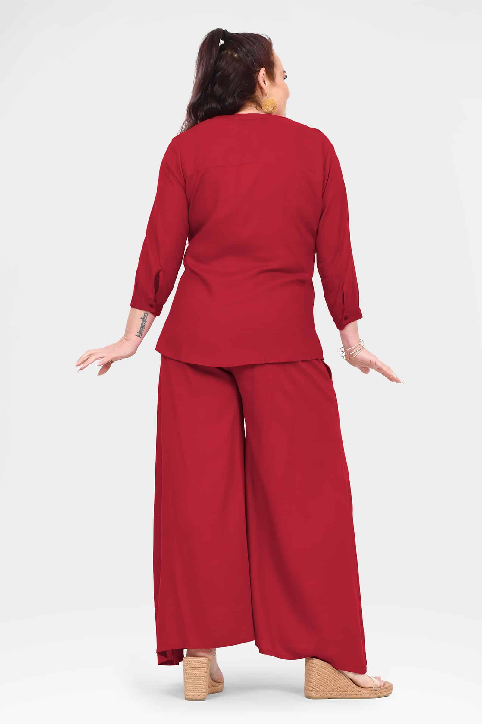 Back view dark red wide-leg pants with smooth waistband and wide hem