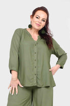 Pistachio Lana top with button-front V-neck and 3/4 sleeves