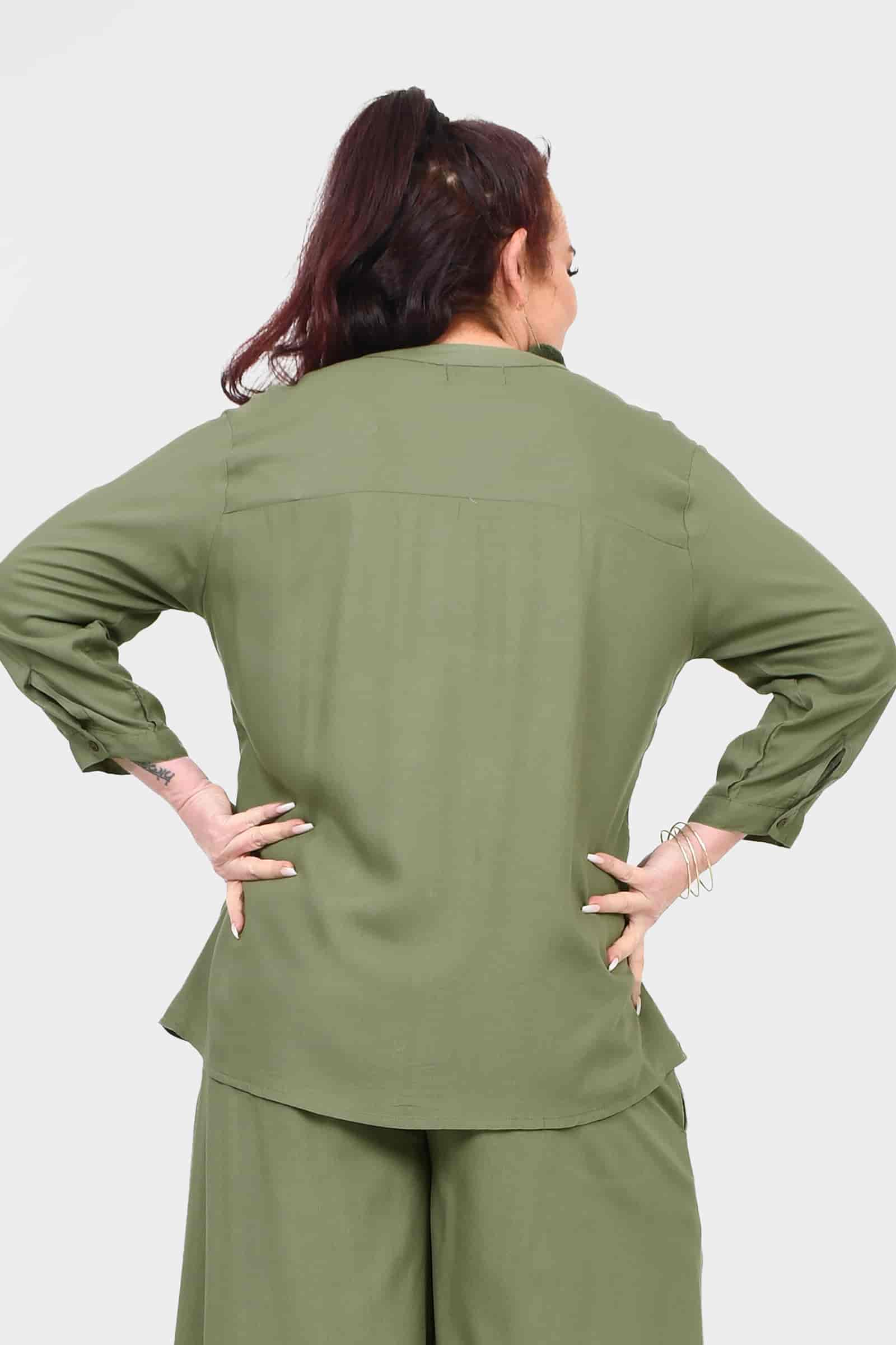 Pistachio Lana top back view with long sleeves and curved hem
