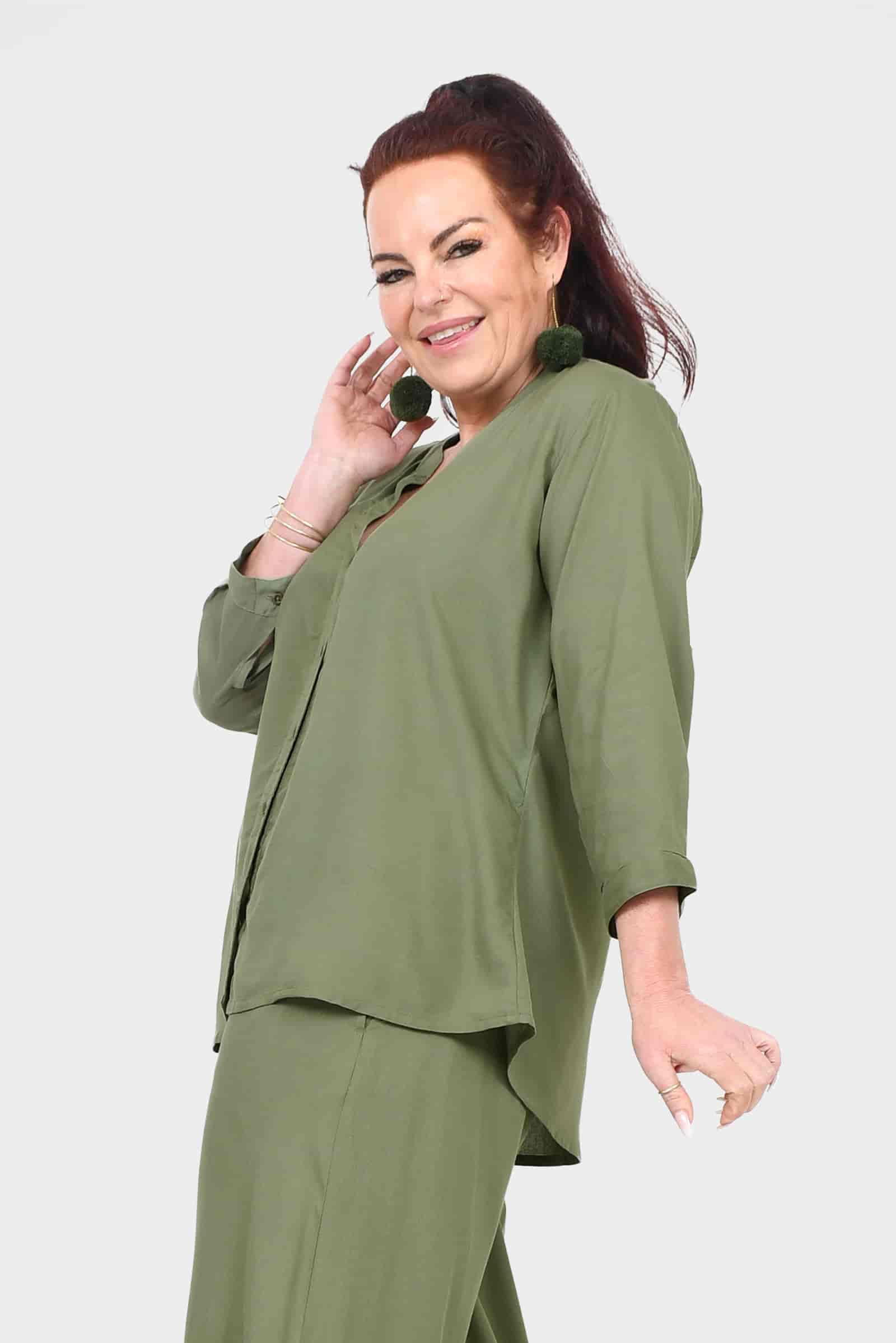 Pistachio Lana top with buttoned front and curved high-low hem, 3/4 sleeves
