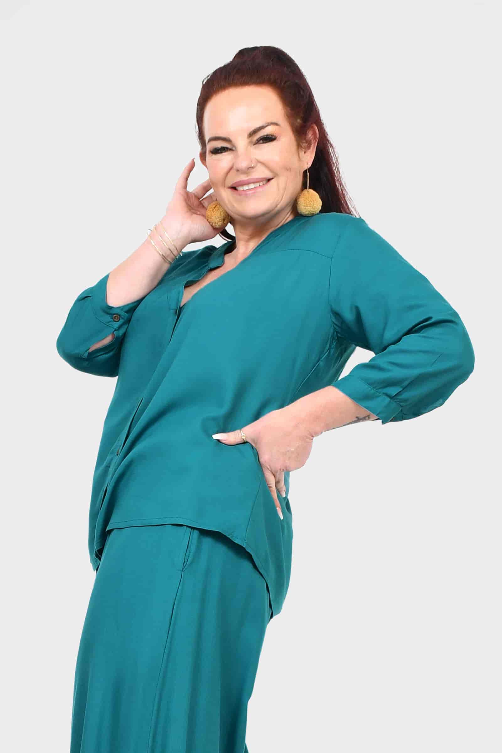 Teal blouse top with button placket, three-quarter sleeves, and V-neck