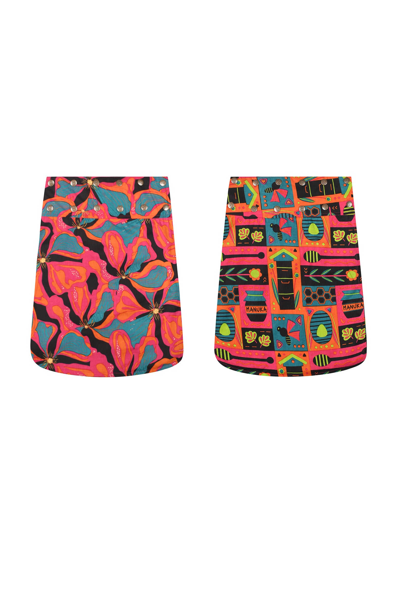 Reversible button skirt with all-over graphic print, bright pink and teal.