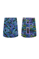 Reversible 3/4 button skirt with colorful abstract pattern, shown on two sides