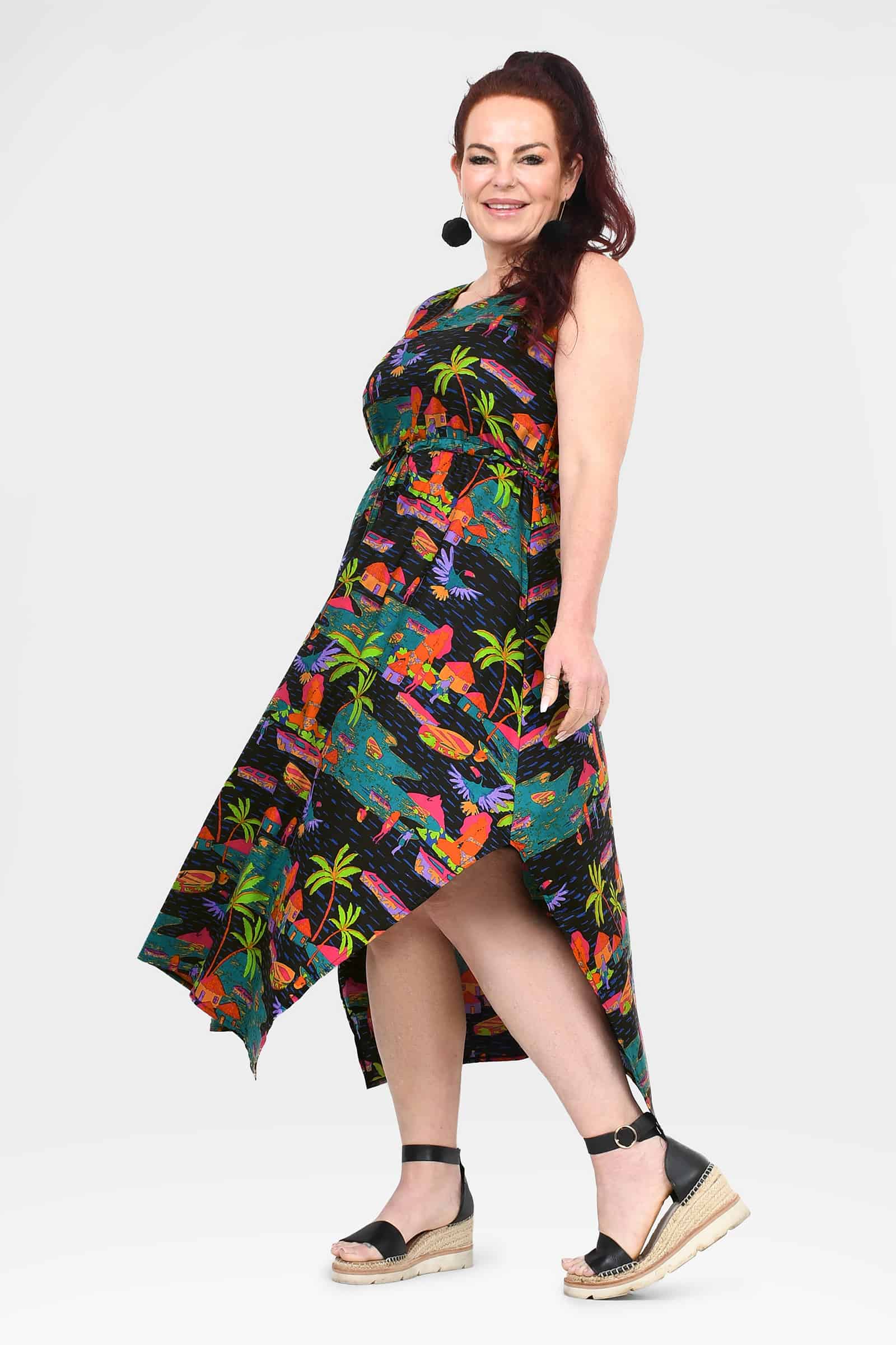 Sleeveless capri dress, tropical print, asymmetrical midi hem and scoop neckline
