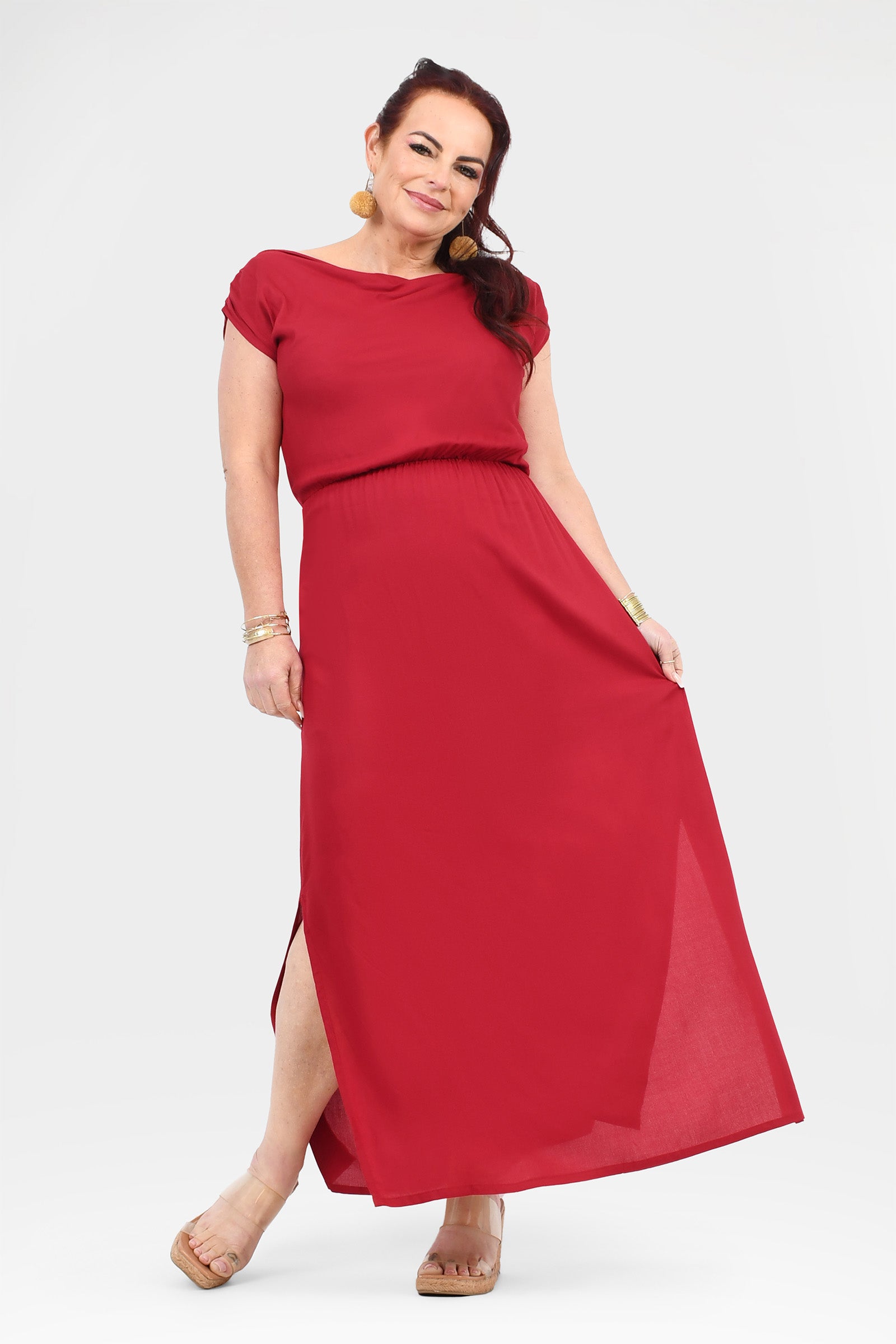 Dark red maxi dress with cap sleeves, gathered waist, and side slit at hem