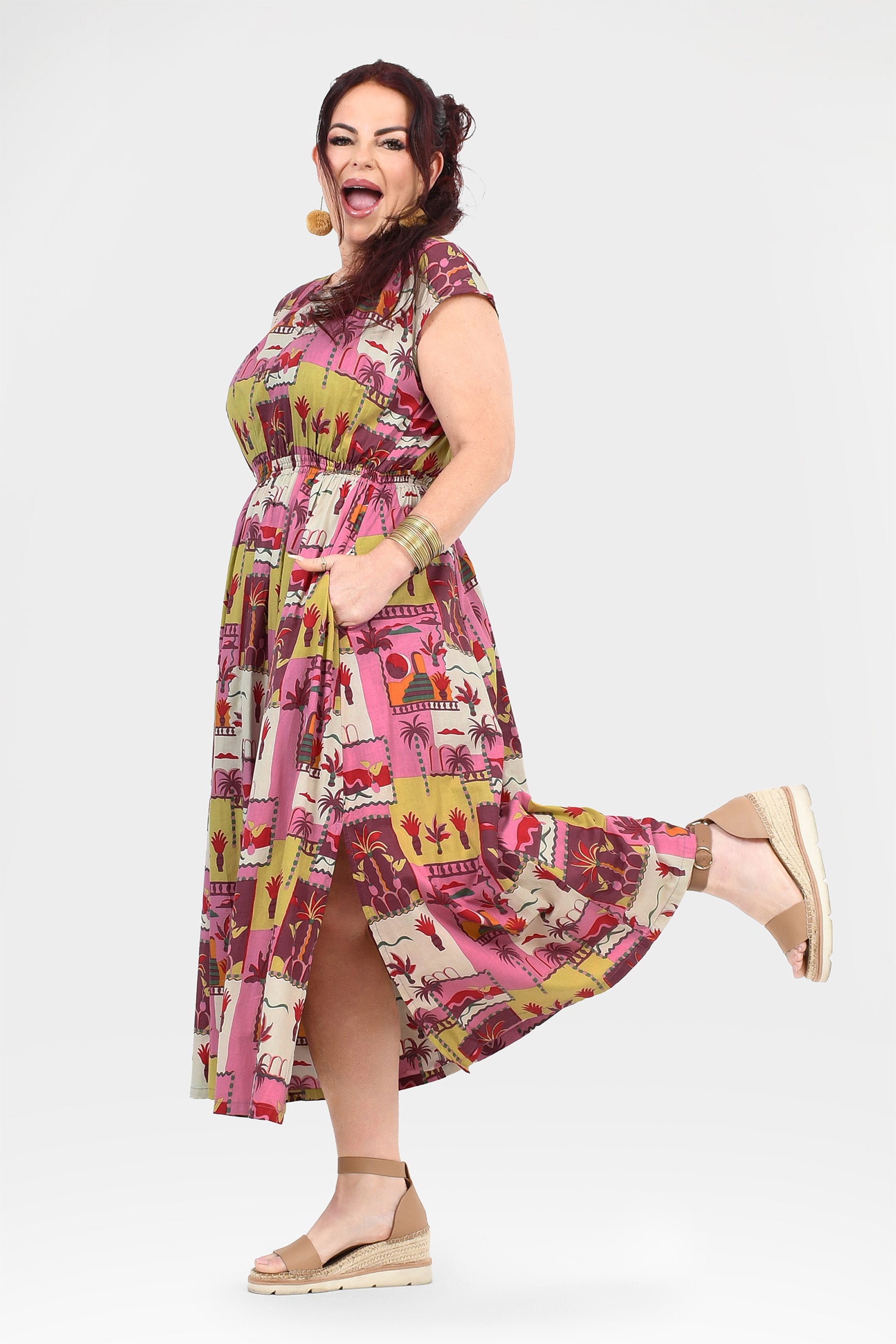 Pink long dress with animal and cactus print, sleeveless look, side slit at hem