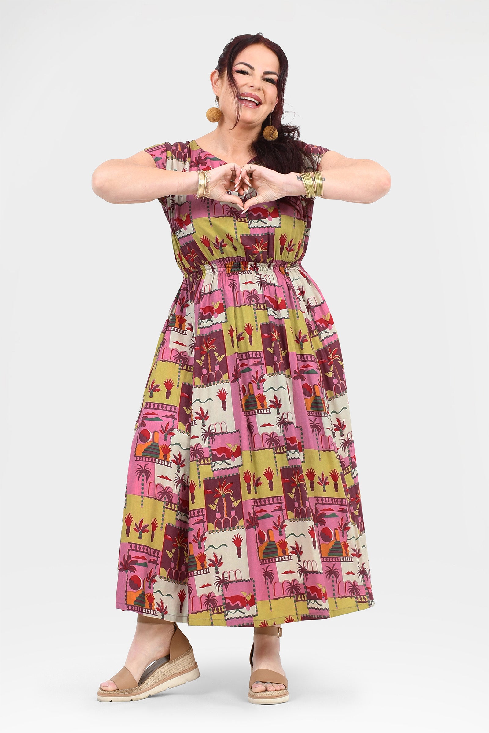 Pink long dress with colorful animal and cactus print, gathered skirt, sleeveless round neck