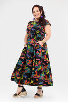 Multicolor tropical print long dress, short sleeves, flared skirt, side view