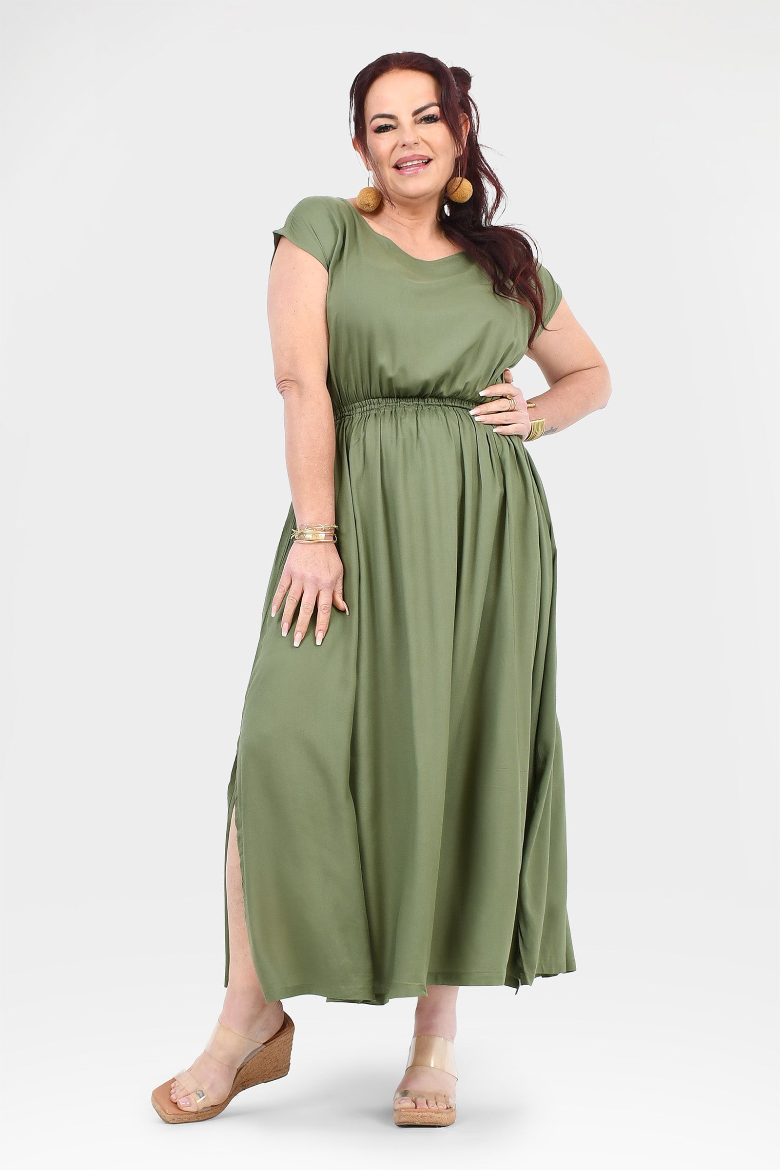 Olive green long maxi dress with gathered waist, short sleeves, and front slit