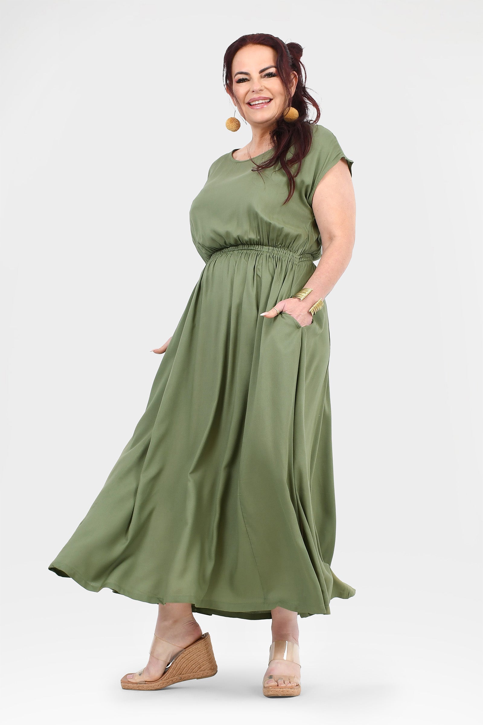 Olive green long dress with gathered waist and cap sleeves, flowing A-line skirt