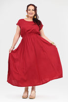 Dark red long dress with short sleeves, gathered waist and full skirt