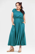 Teal long dress with short sleeves and cinched gathered waist, full skirt