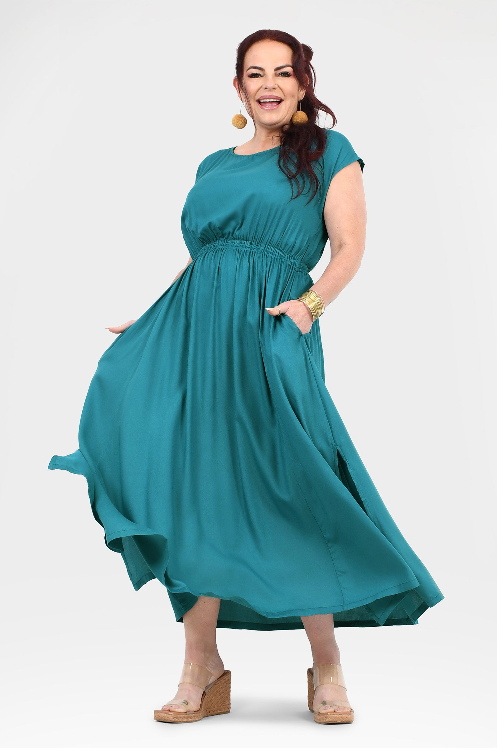 Teal long dress with gathered waist and swing skirt, short cap sleeves