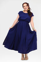 Dark blue long dress with gathered waist, short sleeves, and flowing A-line skirt