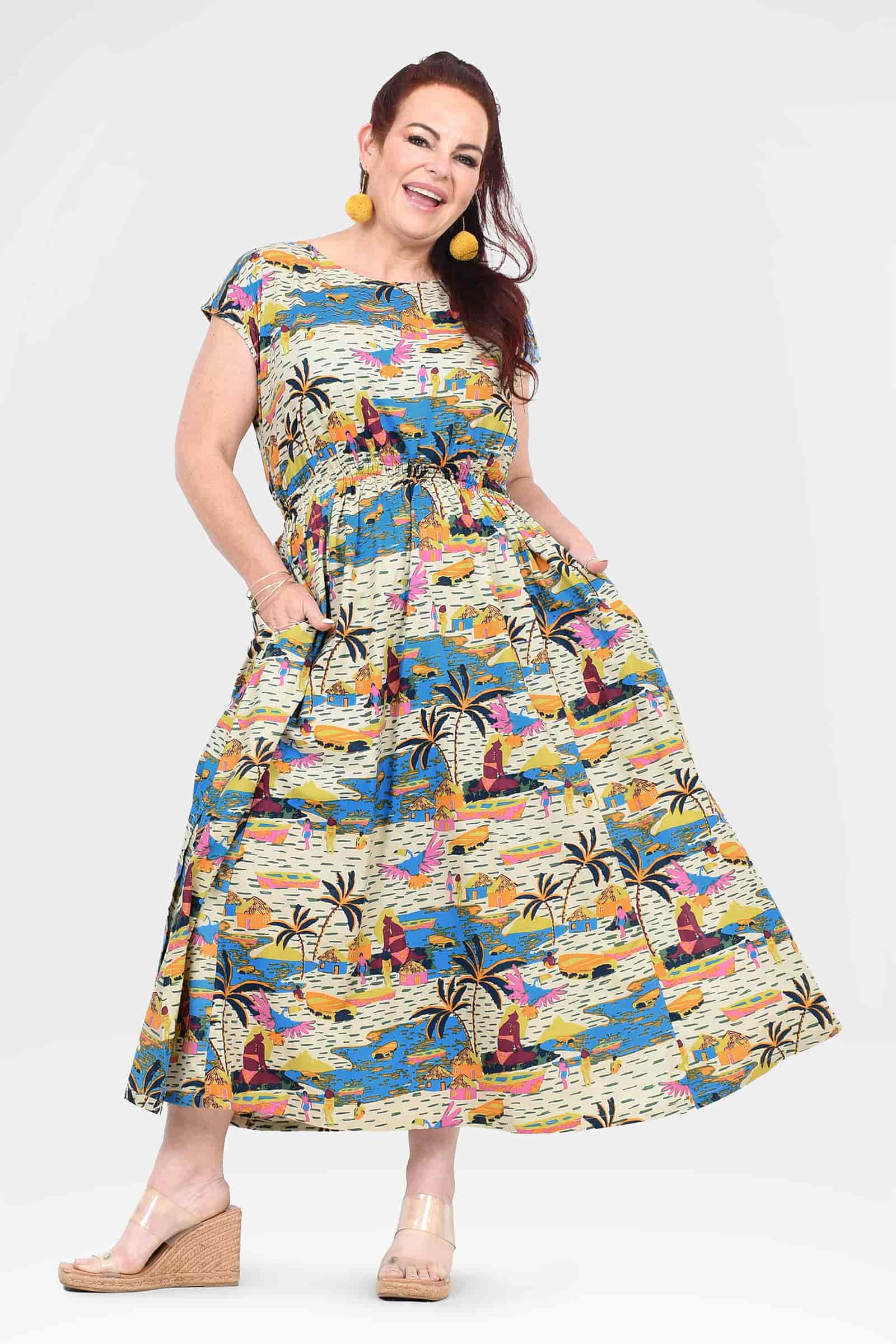 Colorful long flared dress with short sleeves and bright city-and-jungle print