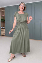 Pistachio long dress with gathered waist and short sleeves