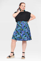 Front view of abstract teal and purple skirt with flared A-line hem