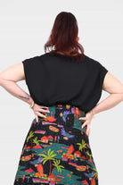 Black short-sleeve top, relaxed fit, back view showing crew neckline.
