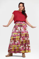 Havana pants in red and pink tiered midi skirt with yellow-lined animal print