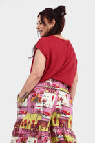 Dark red short-sleeve top with rounded back neckline