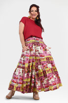 Havana pants front view: pink tiered midi skirt with colorful animal print stripes