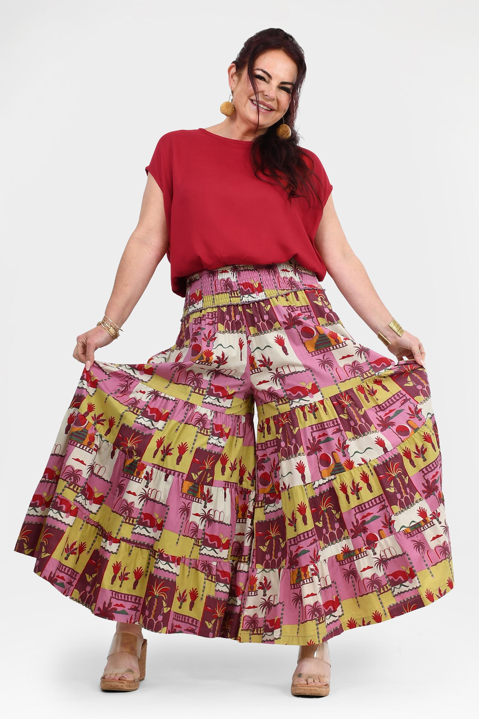 Havana pants front view: red waistband tiered midi skirt with colorful animal print