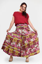Havana pants front view: red waistband tiered midi skirt with colorful animal print